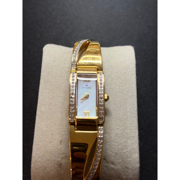 Bulova Bangle Watch Women Gold Mother of Pearl Crystal C865136 Dress